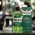 Proraso płyn po goleniu zielony 400ml - butelka i pudełko, widok frontalny na rozmytym tle city lights