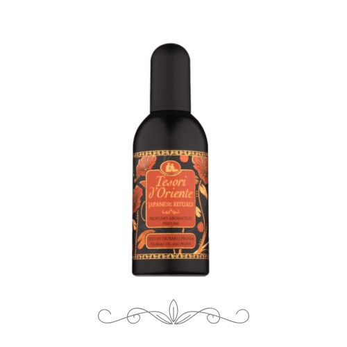 Tesori d'Oriente Japanese Rituals perfumy aromatyczne 100 ml - czarna butelka z etykietą w kolorach pomarańczowym i złotym, widok frontalny na białym tle.