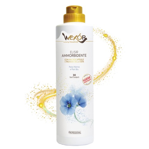 Wexor płyn do płukania Elisir Ammorbidente Fiori Blu 750 ml - biała butelka z golden cap, widok z przodu z efektami graficznymi żółtych i niebieskich cząstek wokół opakowania.