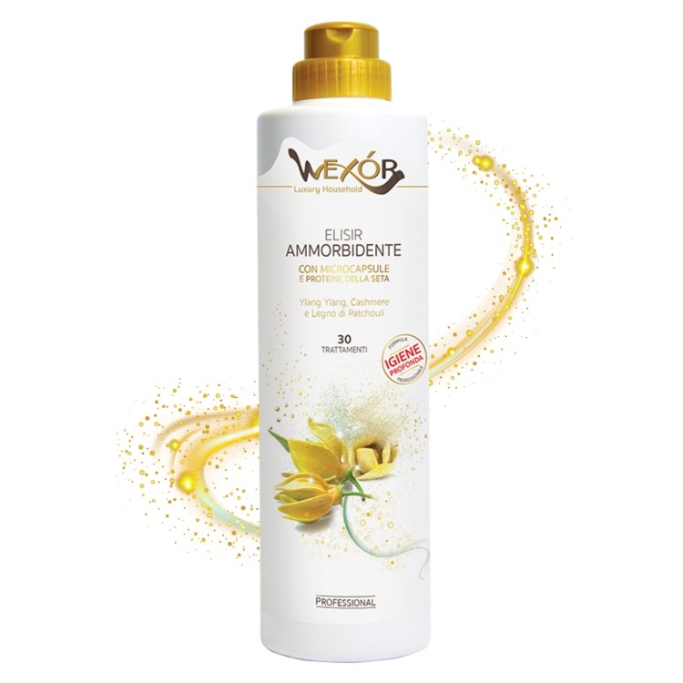 Wexor płyn do płukania Elisir Ammorbidente Yellow Cashmere 750 ml - biała butelka z złotym korkiem na białym tle z efektem rozprysku złotych cząstek.