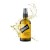 Proraso olejek do brody Wood and Spice 100ml - żółta butelka ze sprayem na białym tle z rozpryskami oleju.