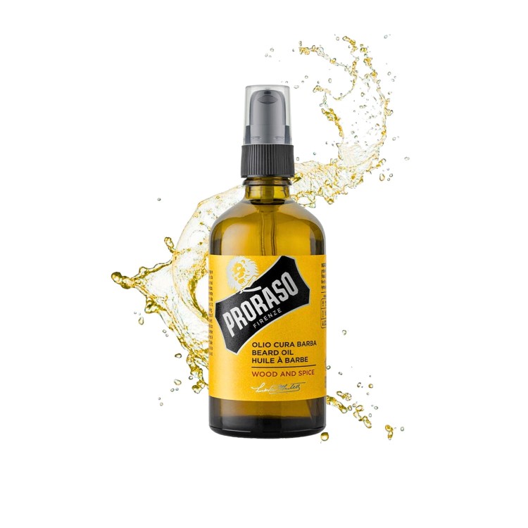 Proraso olejek do brody Wood and Spice 100ml - żółta butelka ze sprayem na białym tle z rozpryskami oleju.