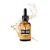 Proraso olejek do brody Wood and Spice 30ml - butelka ze złotym olejem i czarnym pipetą, z wybuchem oleju w tle.