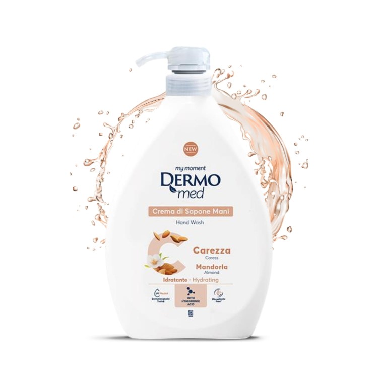 DERMOmed Crema di Sapone Mani Mandorla 1000ml - duża biała butelka z pompką, otoczona rozpryskującą się wodą w odcieniach beżu na białym tle.