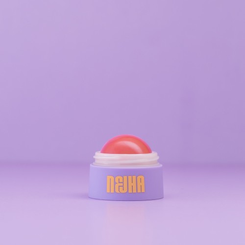 Nejha Don't Be Shy Blush Balm róż do policzków 03 Pop Peach - fioletowe opakowanie z koralowym balsamem, na fioletowym tle
